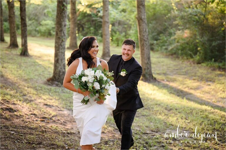 Bride and Groom Running through trees